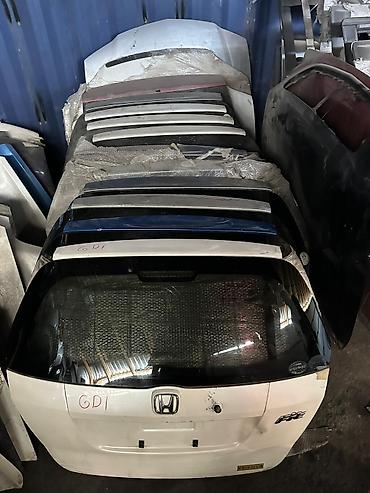 Крышка багажника (пятая дверь) Honda Fit/Aria/Jazz (семейство Fit