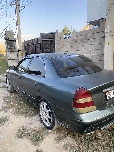 чехлы на х: Daewoo Nubira: 1999 г., Бензин, Седан — 4
