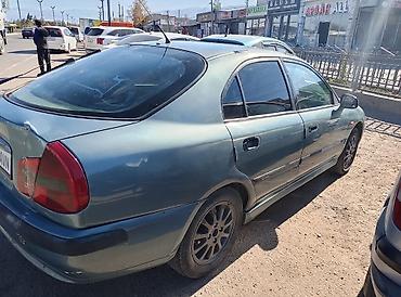 kia rio 2017: Mitsubishi Carisma: 2002 г., Бензин, Седан — 4