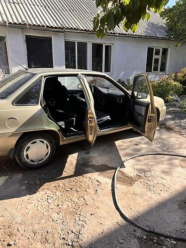 daewoo labo: Daewoo Nexia: 2010 г., Механика, Бензин, Седан — 9