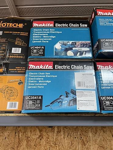Араалар: Электрические цепные пилы Makita (серия UC) Модели на фото: - UC3041A — 2