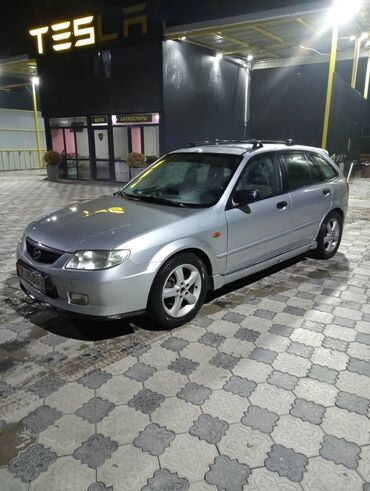 авто хаммер: Mazda 323: 2003 г., 2 л, Механика, Бензин, Хетчбек