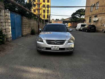 vuruq masnlar: Nissan Altima: 2.5 л | 2004 г. Седан