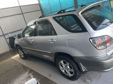 lexus rx 300 правый руль: Внедорожник Lexus RX300 серебристого цвета с рейлингами на крыше и