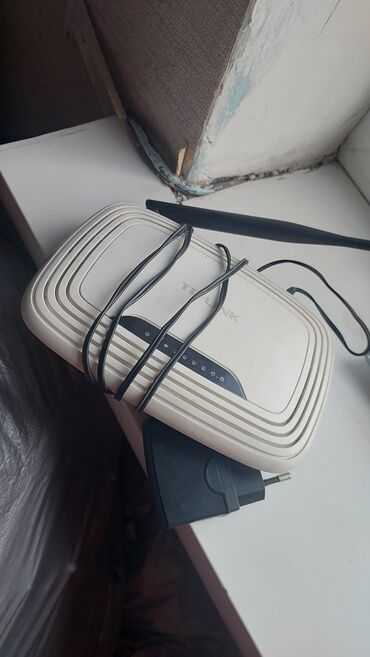wifi роутер о: Белый Wi-Fi роутер TP-Link с внешней антенной, предназначенный для