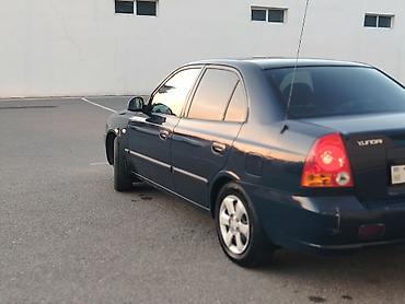 disk masin: Hyundai Accent sedan - Kuzov: 4 qapılı sedan, tünd mavi rəng - — 8