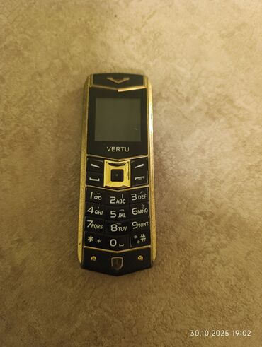 телефон fly с кнопками: Vertu Aster, Кнопочный