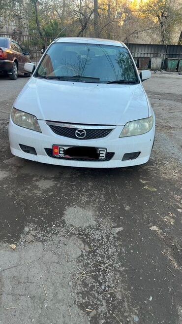 машины в продаже: Mazda Familia: 2001 г., 1.5 л, Автомат, Бензин