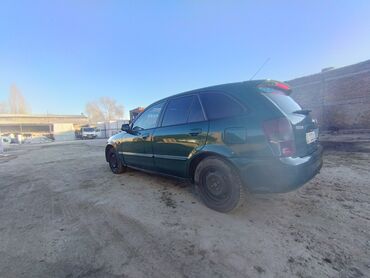 Mazda: Mazda 323: 2000 г., 1.6 л, Механика, Бензин, Седан