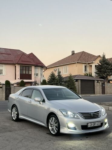 тойота чайзер купить: Элегантный седан Toyota Crown Hybrid серебристого цвета