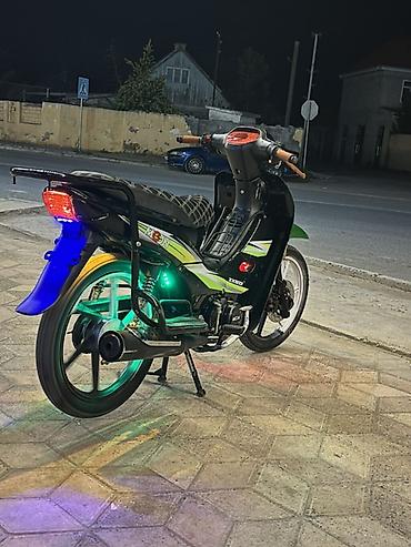 Mopedlər,skuterlər: Moped/skutər – şəhər içi rahat gediş üçün yığcam və qənaətcil model — 2