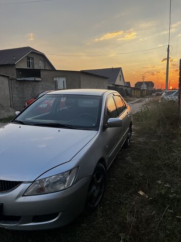 авто 50000: Mitsubishi Lancer: 2004 г., 1.4 л, Механика, Бензин, Седан