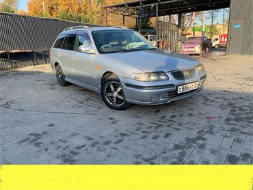 авто симулятор: Mazda Capella: 2000 г., 2 л, Автомат, Бензин, Универсал