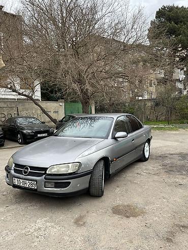 opel omega: Opel Omega: 2.5 l | 1994 il Sedan — 1