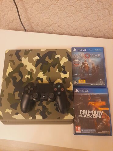 сколька стоит плейстейшен 4: Sony PlayStation 4 Slim 1Tb oyun konsolu kamuflyaj dizaynlı korpusa