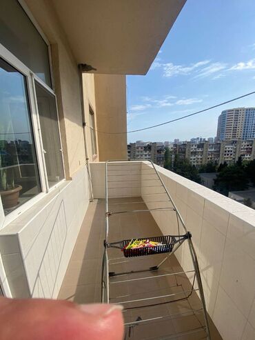 Uzunmüddətli kirayə mənzillər: 9-cu mikrorayonda Bolmart marketin yanında 17 mərtəbəli binanın 7-ci — 8