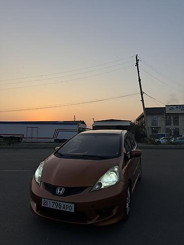 w210 55: Honda Fit: 2010 г., 1.5 л, Вариатор, Бензин, Хэтчбэк — 2