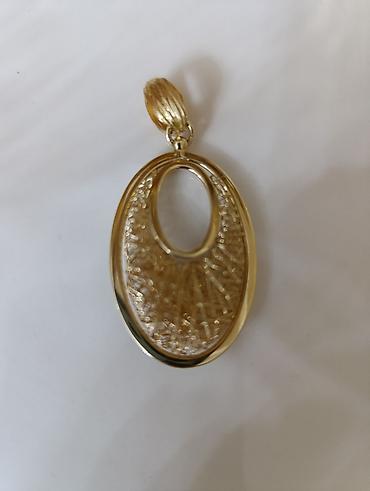 Oval formalı qızılı rəngdə kulon - Dizayn: İkiqat oval çərçivə