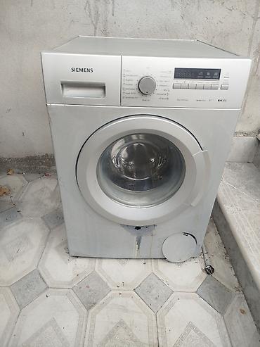 Paltaryuyan maşınlar: Siemens paltaryuyan maşın – ön yükləməli, elektron idarəetmə paneli — 1