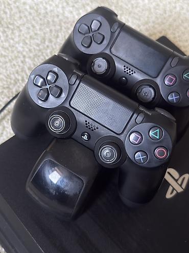 видио игры: Игровая консоль PlayStation 4 Pro (черная) с аксессуарами — 1