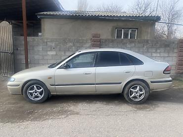 Mazda: Mazda 626: 1997 г., 1.8 л, Механика, Бензин, Седан — 2