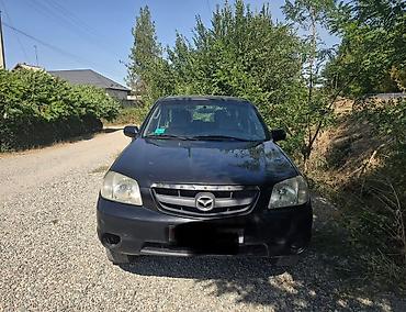 магнитола мазда: Mazda Tribute: 2001 г., 2 л, Механика, Бензин, Кроссовер — 8