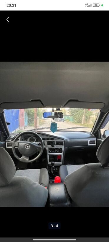 руль чехлы: Салон и приборная панель автомобиля с классической компоновкой