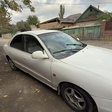 Транспорт: Hyundai Elantra: 1995 г., Механика, Бензин, Седан — 7
