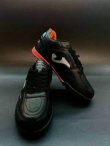 Бутсы: Сороконожки Joma белого цвета с синими вставками. Отлично подойдут — 4