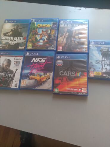 Игровые диски и картриджи: PS-4 oyun diskləri ideal vəziyyətdədirlər The Witcher 25 azn Mad Max
