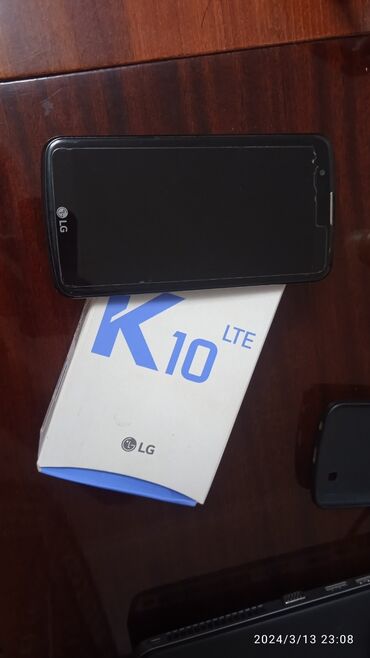 лж телефон: LG K10, Б/у, цвет - Черный