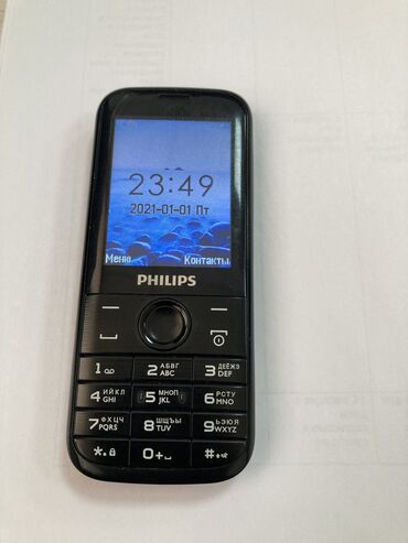 телефон 10: Philips Xenium E160. 2sim рабочий. В комплекте только зарядный шнур