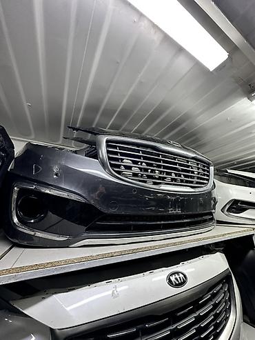 Передний бампер в сборе для Kia (оригинал). Состав: - Бампер передний