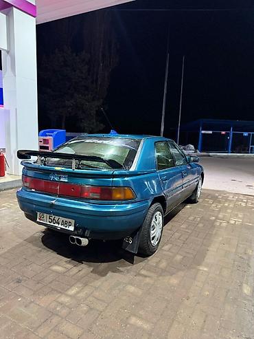 Mazda: Mazda 323: 1995 г., 1.5 л, Механика, Бензин, Седан — 4
