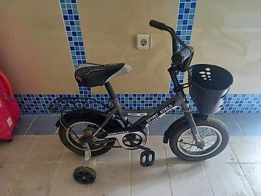 Sabi Usaq velossipedi satilir. 12~14luk. Teze kimidi cox az surulub