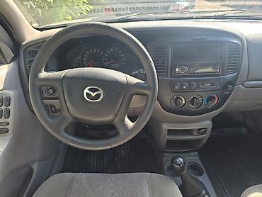 пробег пробега: Mazda Tribute: 2001 г., 2 л, Механика, Газ, Кроссовер — 5