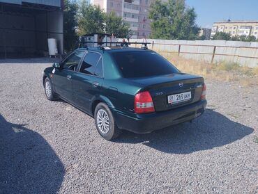 мазда примаст: Mazda 323: 1998 г., 1.5 л, Механика, Бензин