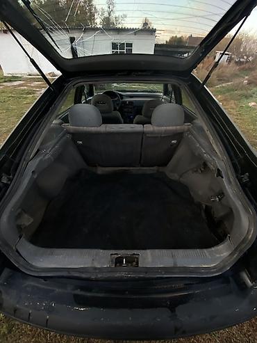 митсубиши спейс стар: Mazda Eunos 500: 1992 г., 2 л, Механика, Бензин, Седан — 5