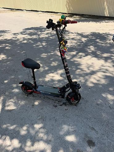 kugoo m4 pro: Elektrik skuter – oturacaqlı, güclü işıqlanma və disklə əyləclər - — 1