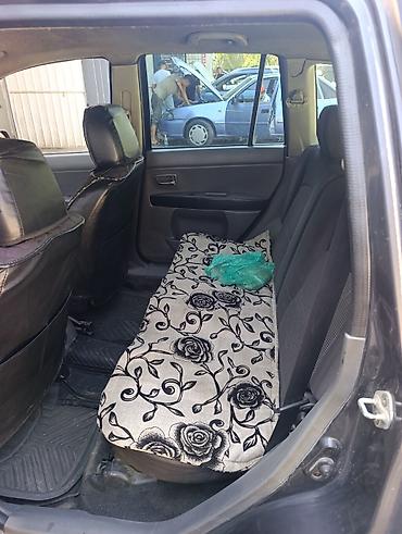 спинка: Mazda Demio: 2006 г., 1.3 л, Автомат, Бензин, Хэтчбэк — 8