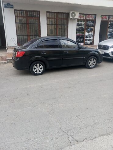 Kia: Kia Rio: 1.4 l | 2010 il Sedan — 24