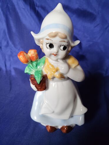 Ostali kućni dekor: Figura nova,vintaz,holandjanka sa lalama porcelanska. Nova — 8