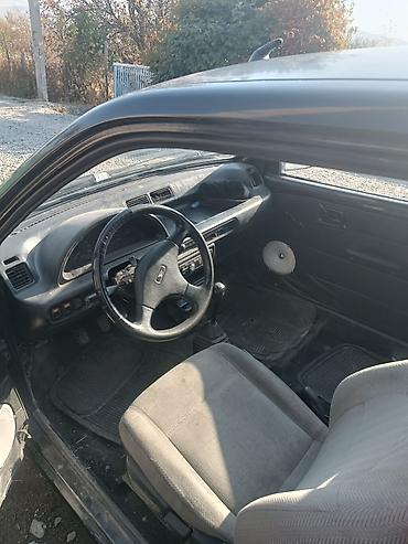mersedes 212: Daihatsu Cuore: 1994 г., Механика, Бензин, Хэтчбэк — 4