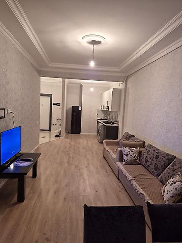 doner icare: Baxça şəhər yaşayış kompleksi 2 otaqlı studio tipli 65 kvadrat mənzil — 1
