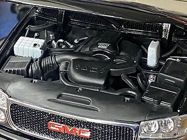 Avtomobil modelləri: Коллекционная модель GMC Yukon Denali black 2001 Welly Art  — 19