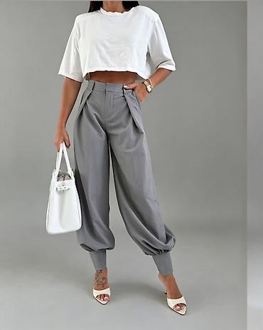 helanke m: Ženske pantalone sa širokim nogavicama i manžetnama
2300 din 
S M L — 1