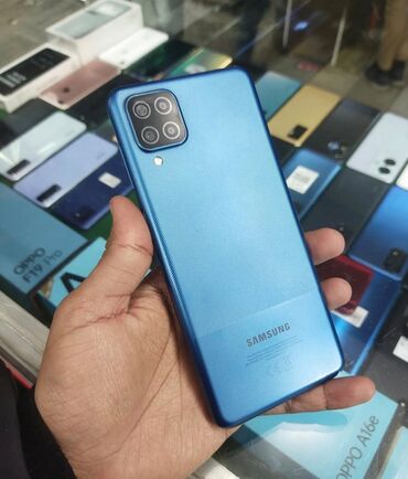 ekran ucun sade sekiller: Samsung Galaxy A12, цвет - Голубой, Беспроводная зарядка