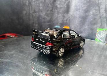 Avtomobil modelləri: Коллекционная модель Mitsubishi Lancer Evolution VII black 2002 — 7