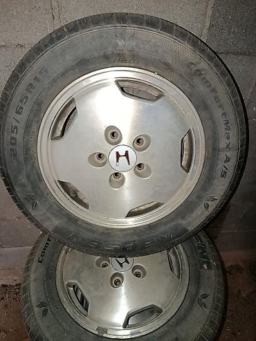 домкраты авто: Колеса в сборе 205 / 65 / R 15, Всесезонная, Б/у, Комплект, Легковые, Железные, отверстий - 4 — 1