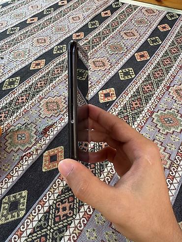 lg ka 10: IPhone SE 2022, 64 GB, Qara, Barmaq izi — 4